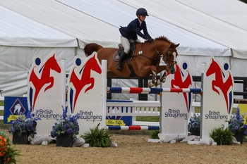 Daniella Johnston aboard Cavalier Road win the National 1.25m Restricted Rider Championship Final